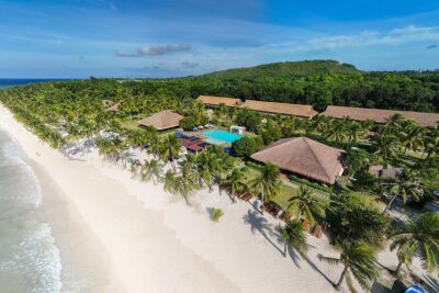 Aerial picture of Bohol Beach Club, capturing the serene beauty of an exclusive resort in Palawan.