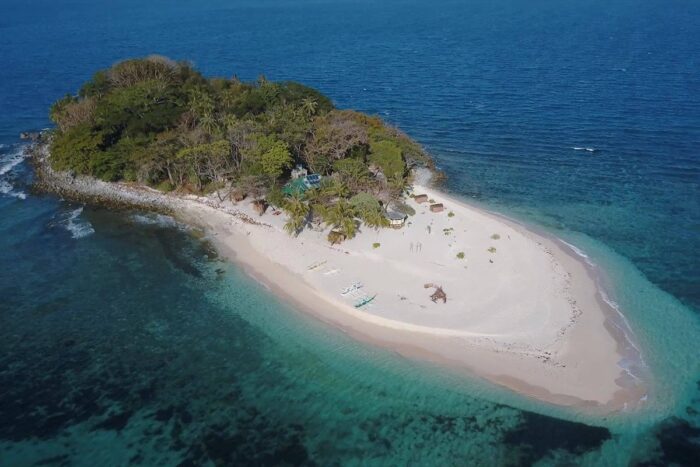 Aerial shot of Brother Island, a private island in Palawan. This is a perfect island for rent to celebrate special events with exclusivity and privacy.